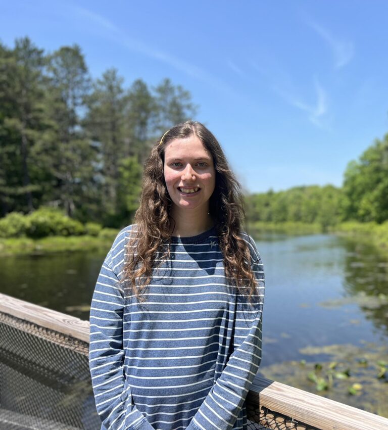 Ashley in front of Lake Wapalanne
